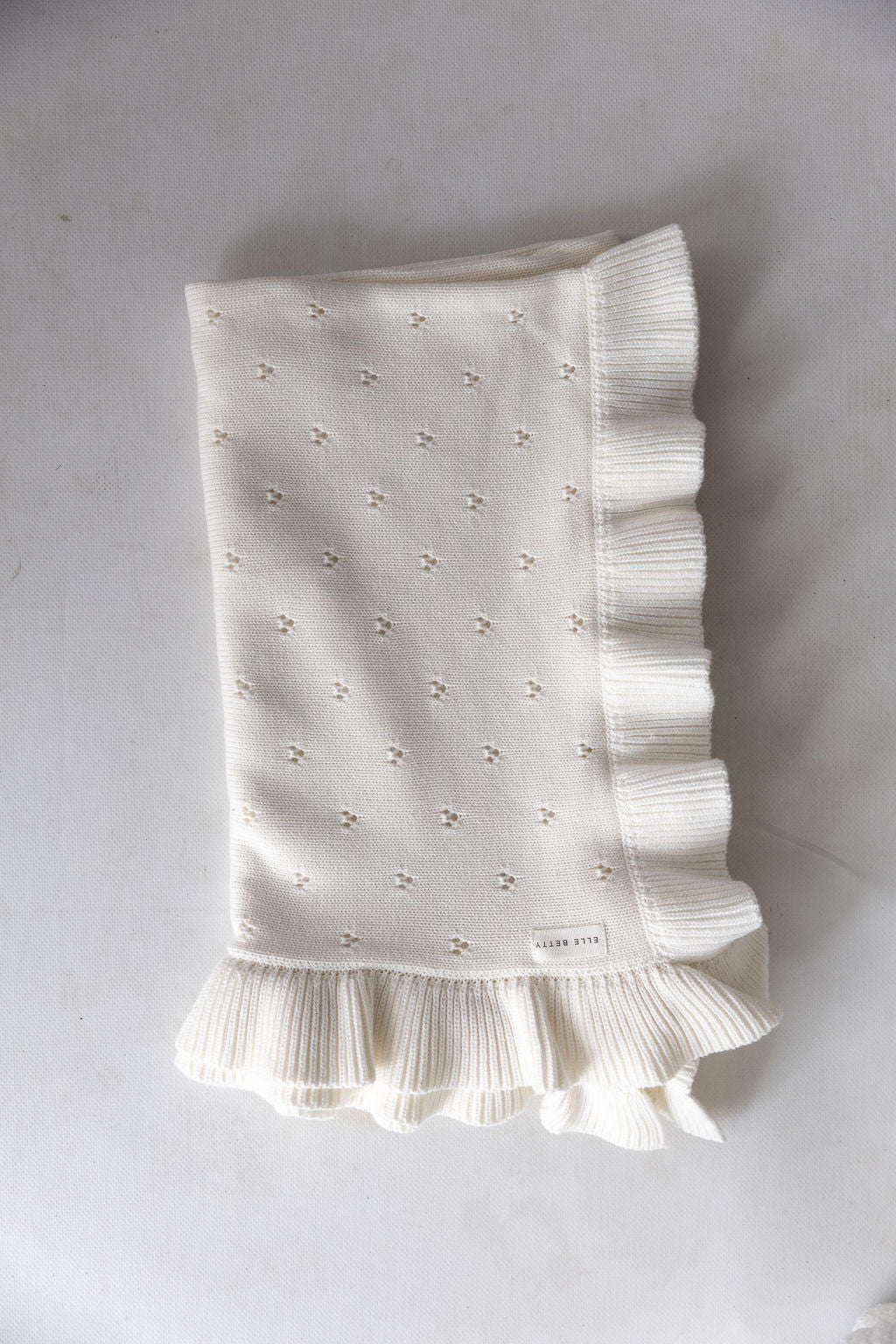 Lottie Ruffle Knit Blanket