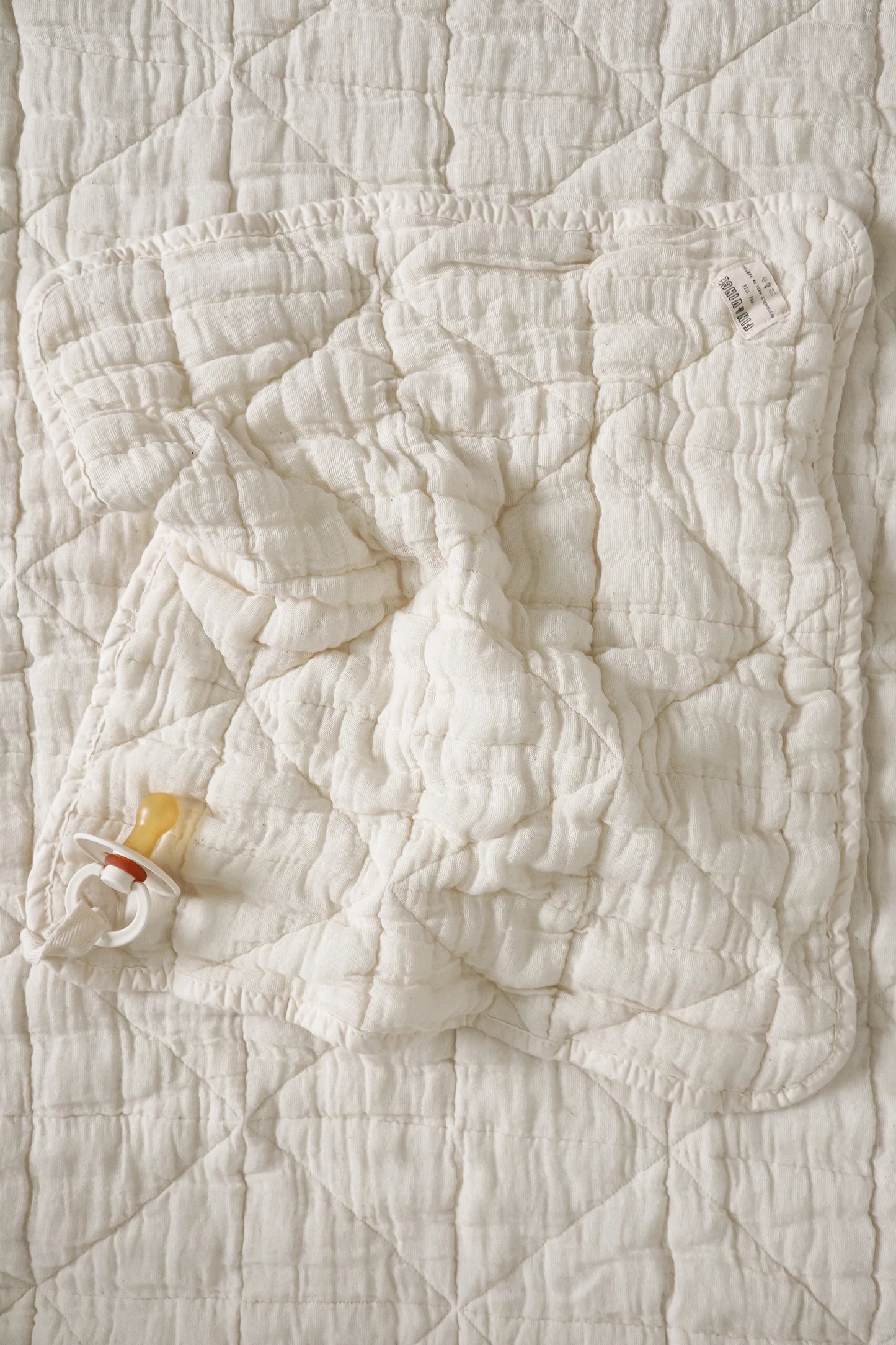 lovie quilted | mini - natural